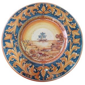Piatto cap. prete Ø 35 c/veliero ornato fondo blu